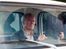 C.Eastwood Gran Torino in auto foto poster
